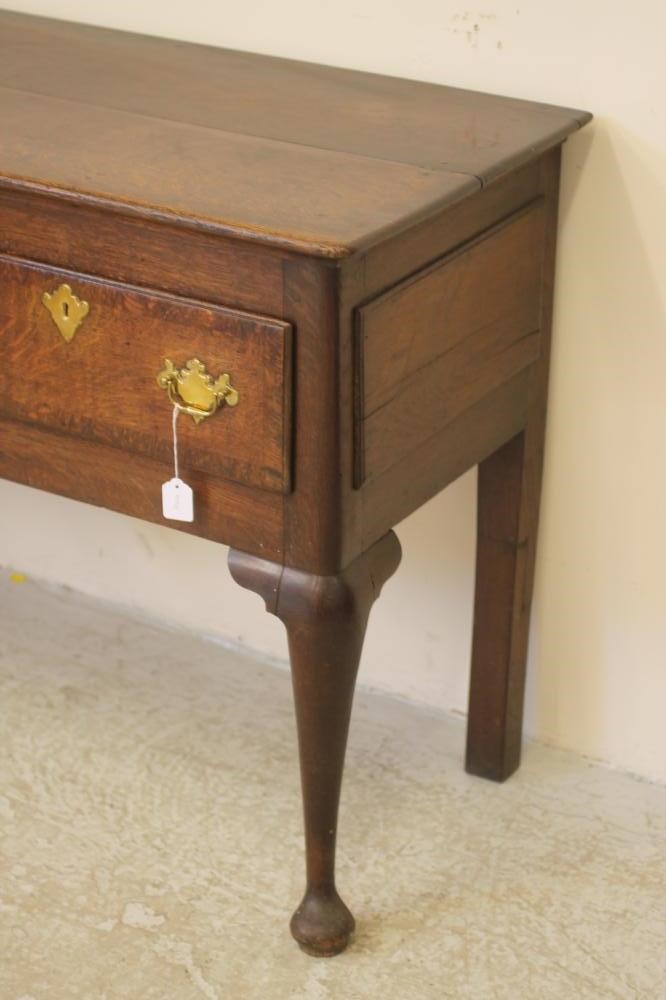A GEORGIAN OAK AND MAHOGANY BANDED LOW DRESSER Image