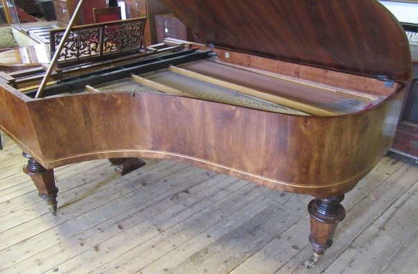 A BOUDOIR GRAND PIANO by Rufolf Stelzhamer in walnut case with stringing Image