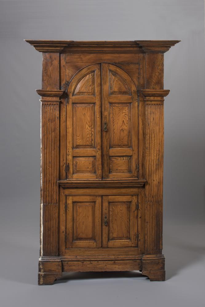 A GEORGIAN ELM STANDING CORNER CUPBOARD of architectural form with inverted breakfront moulded Image