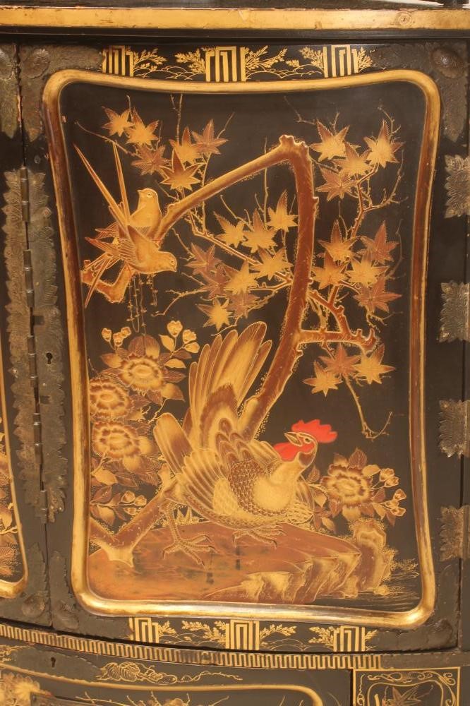 A CHINESE BLACK LACQUERED CORNER CUPBOARD Image