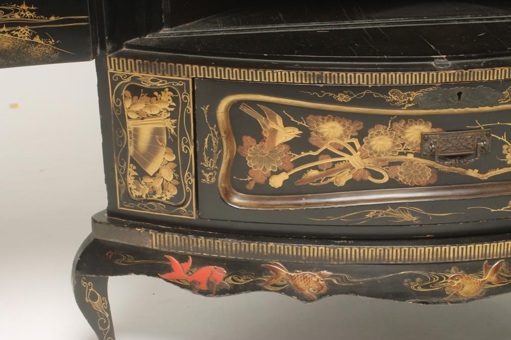 A CHINESE BLACK LACQUERED CORNER CUPBOARD Image