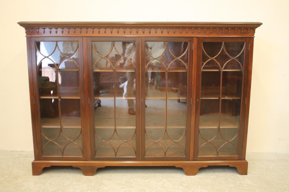 A GLAZED MAHOGANY BOOKCASE Image