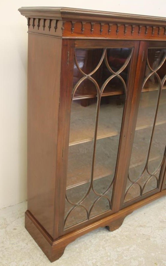 A GLAZED MAHOGANY BOOKCASE Image