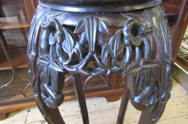 A CHINESE HARDWOOD JARDINIERE STAND Image