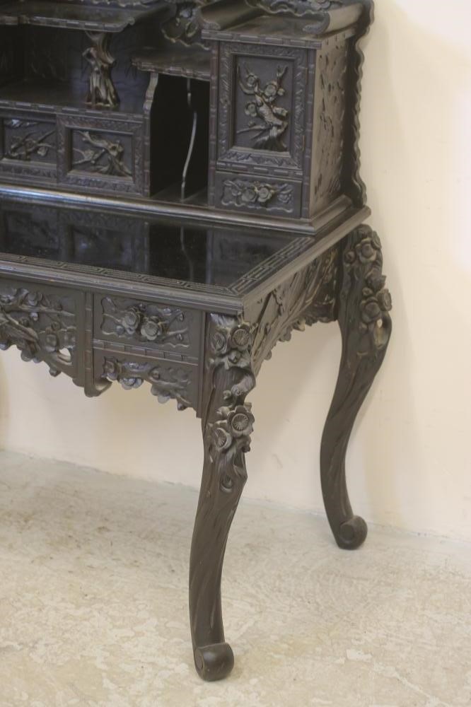 A CHINESE CARVED HARDWOOD DESK Image