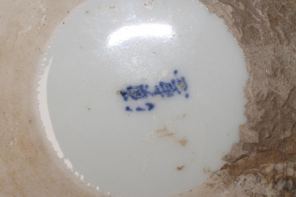 A JAPANESE PORCELAIN JAR AND COVER of cylindrical form raised upon three bracket feet Image