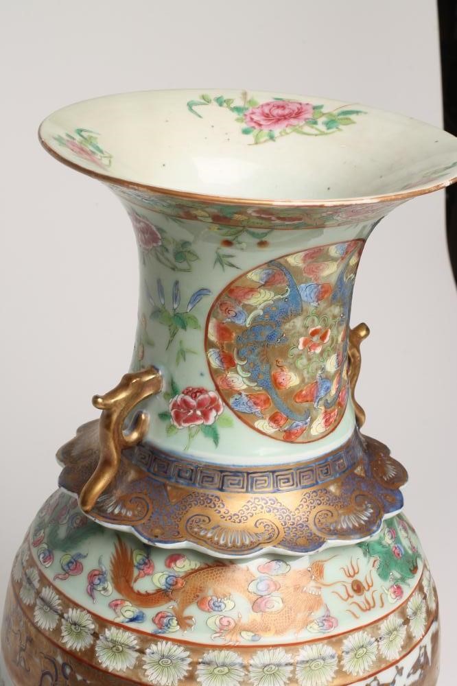 A CANTONESE PORCELAIN VASE of baluster form with loop handles and everted frilled shoulder rim Image