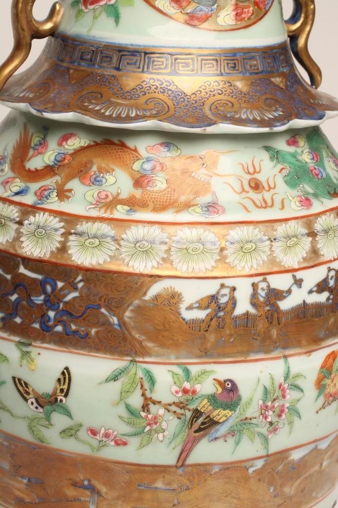 A CANTONESE PORCELAIN VASE of baluster form with loop handles and everted frilled shoulder rim Image