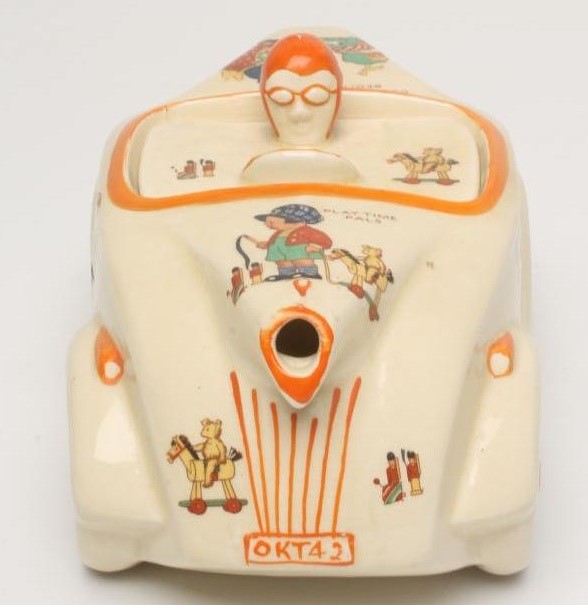 A SADLER POTTERY MABEL LUCIE ATTWELL RACING CAR NOVELTY NURSERY TEAPOT Image