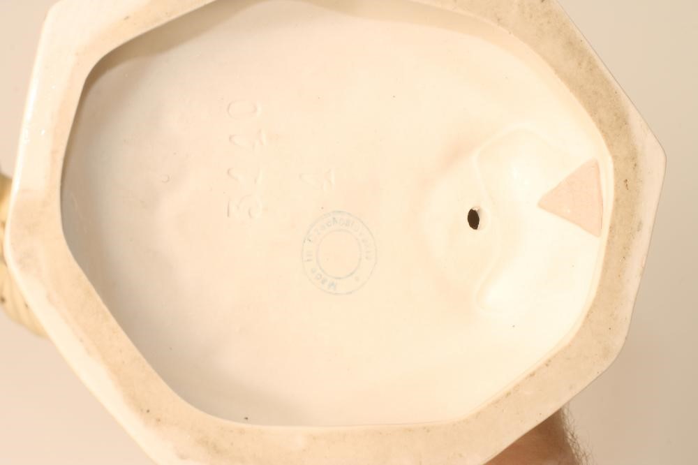 AN ART DECO ROYAL DUX BISQUE PORCELAIN FIGURE OF A YOUNG GIRL with shingled hair Image