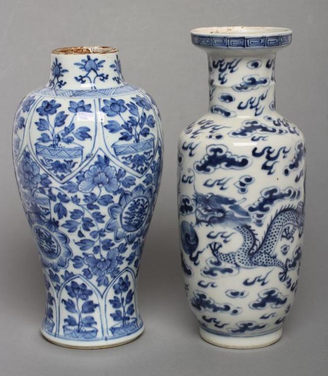 A CHINESE PORCELAIN ROULEAU VASE painted in underglaze blue with two dragons chasing the flaming Image