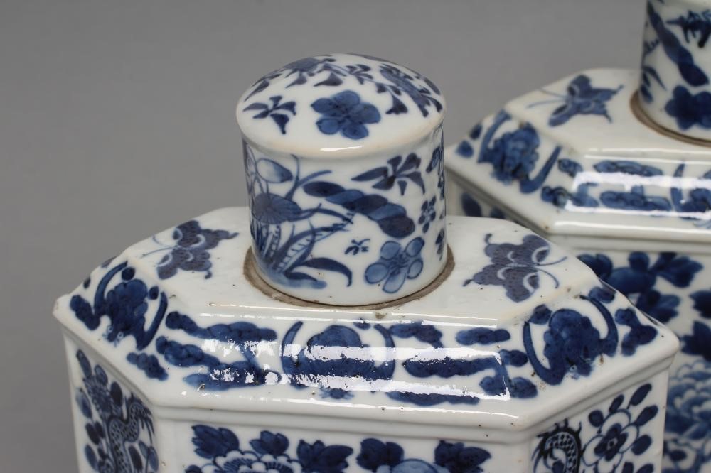 A PAIR OF CHINESE PORCELAIN CANISTERS AND COVERS of canted oblong form Image