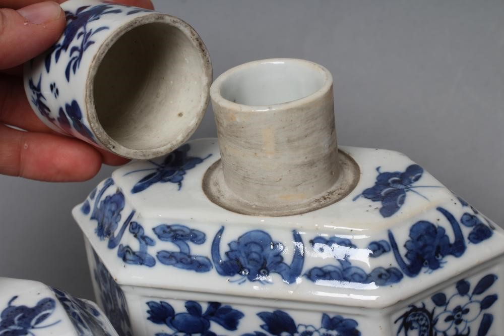 A PAIR OF CHINESE PORCELAIN CANISTERS AND COVERS of canted oblong form Image
