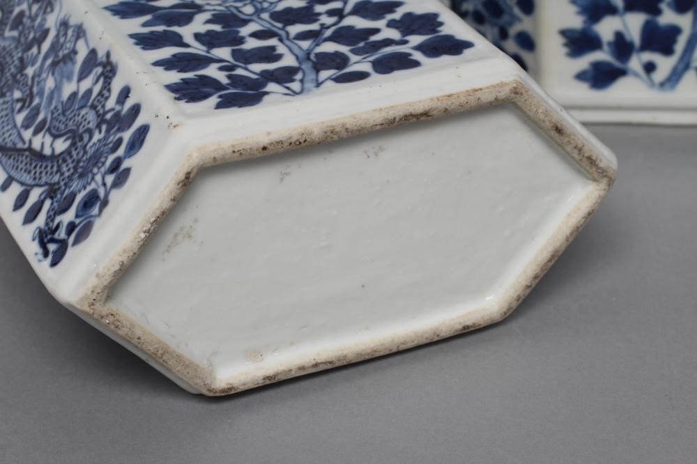 A PAIR OF CHINESE PORCELAIN CANISTERS AND COVERS of canted oblong form Image