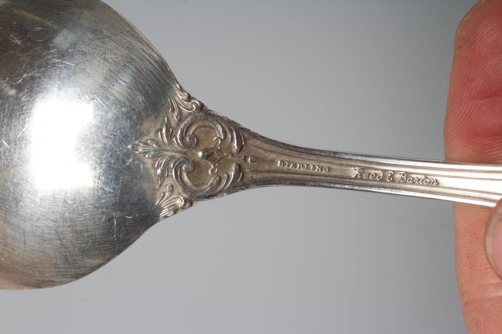 A SET OF EIGHT SOUP SPOONS, maker Reed & Barton, stamped Sterling, in Francis I pattern, 17ozs 9dwts Image