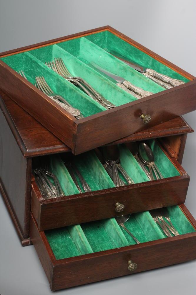 A TABLE SERVICE FOR EIGHT PLACE SETTINGS Image