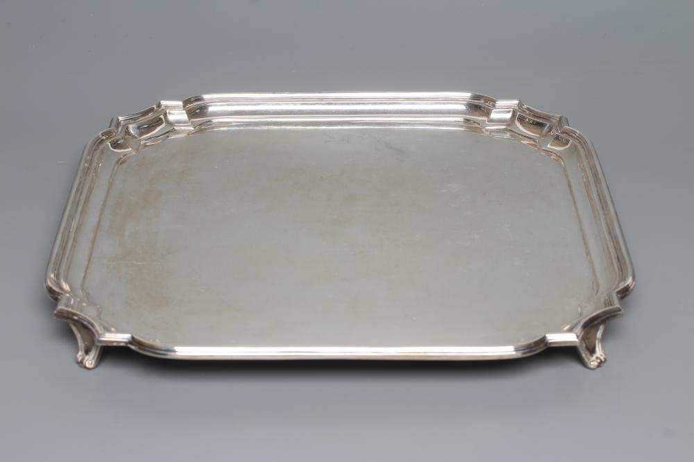 A SALVER, maker Wm. Haseler, Sheffield 1943, of canted square form with pie-crust rim, raised upon Image