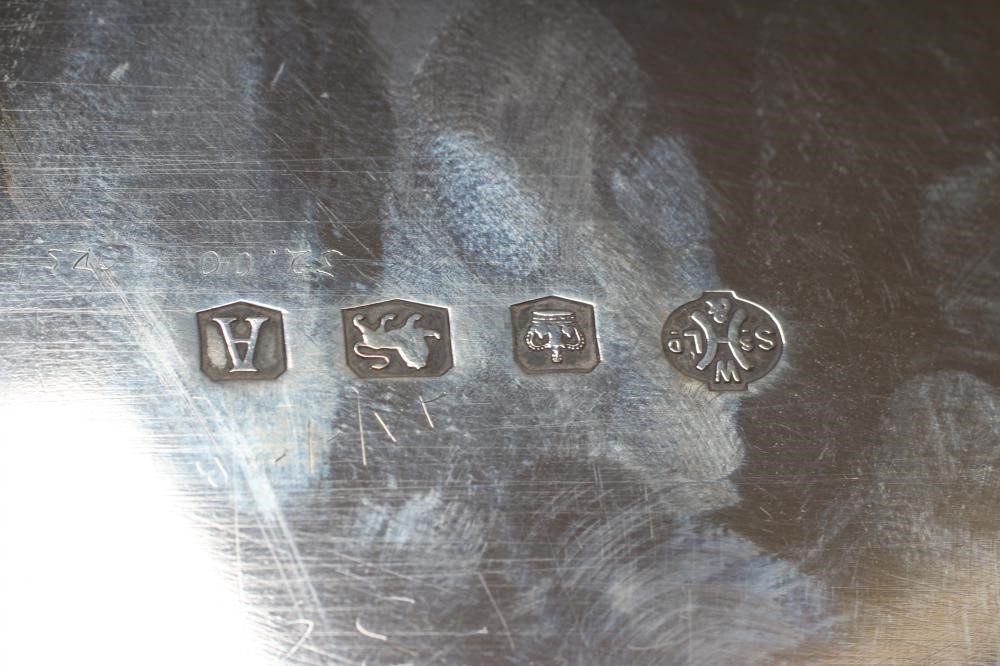 A SALVER, maker Wm. Haseler, Sheffield 1943, of canted square form with pie-crust rim, raised upon Image