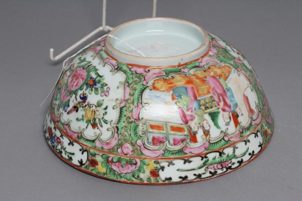 A CANTONESE PORCELAIN FAMILLE ROSE BOWL painted with panels of figures on verandahs and with finches Image