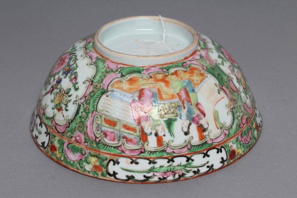 A CANTONESE PORCELAIN FAMILLE ROSE BOWL painted with panels of figures on verandahs and with finches Image