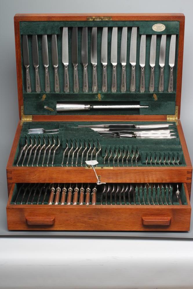 A TABLE SERVICE FOR EIGHT PLACE SETTINGS Image