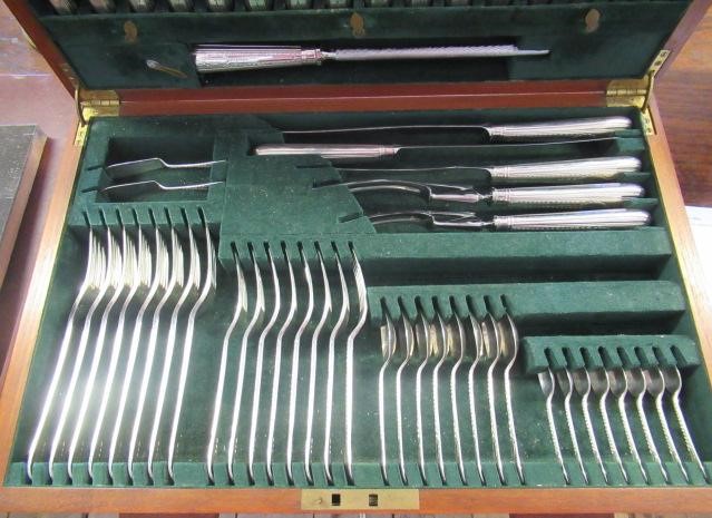 A TABLE SERVICE FOR EIGHT PLACE SETTINGS Image