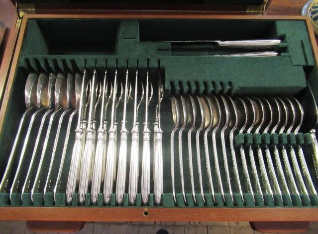 A TABLE SERVICE FOR EIGHT PLACE SETTINGS Image