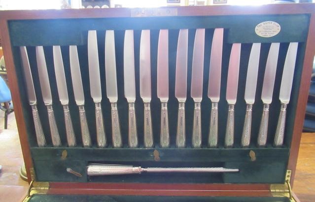 A TABLE SERVICE FOR EIGHT PLACE SETTINGS Image