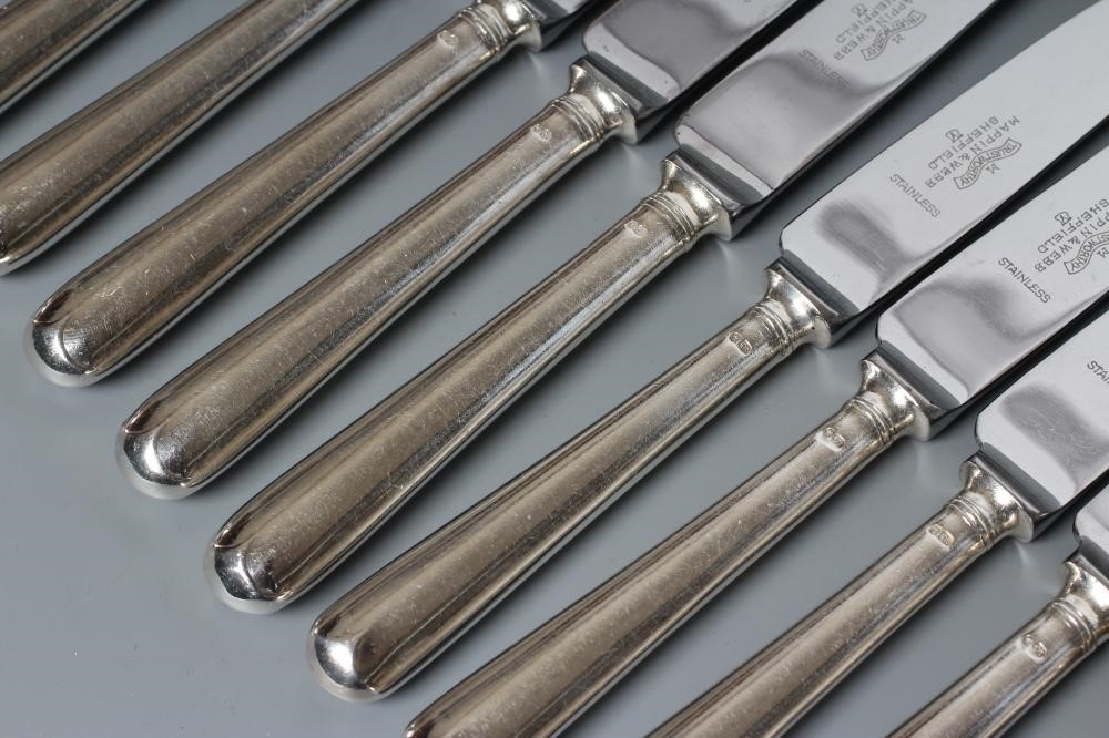 A SET OF EIGHT TABLE KNIVES Image