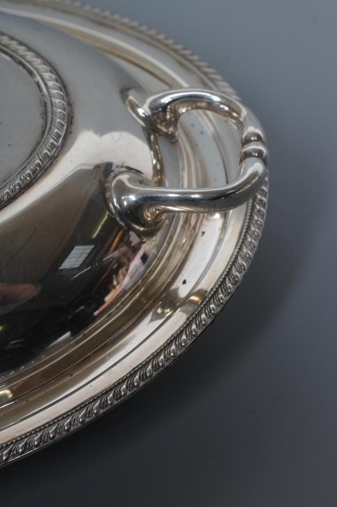 AN OVAL ENTREE DISH AND COVER Image