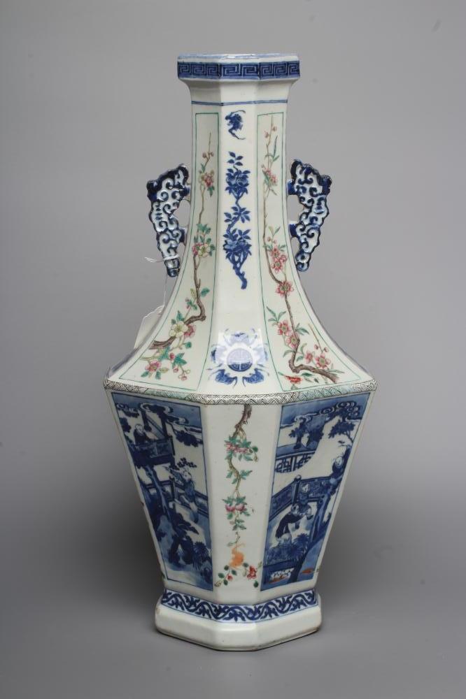 A CHINESE PORCELAIN VASE of swept octagonal form with two scrolling handles Image