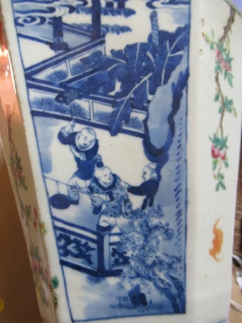 A CHINESE PORCELAIN VASE of swept octagonal form with two scrolling handles Image