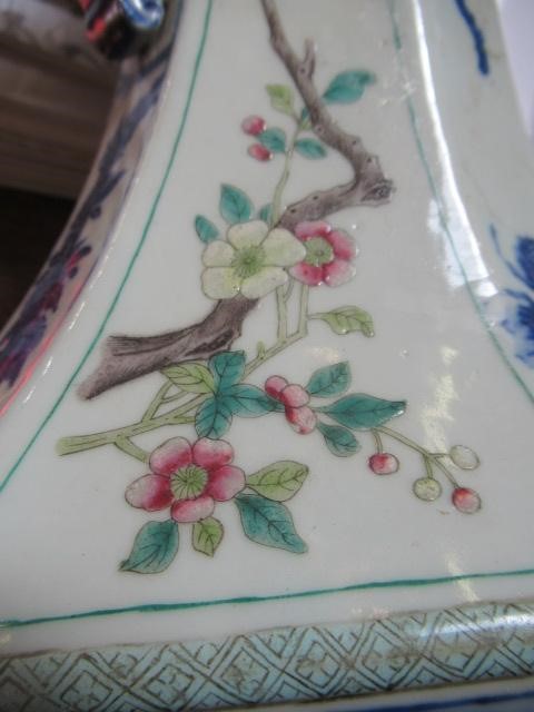 A CHINESE PORCELAIN VASE of swept octagonal form with two scrolling handles Image