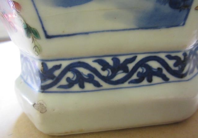 A CHINESE PORCELAIN VASE of swept octagonal form with two scrolling handles Image