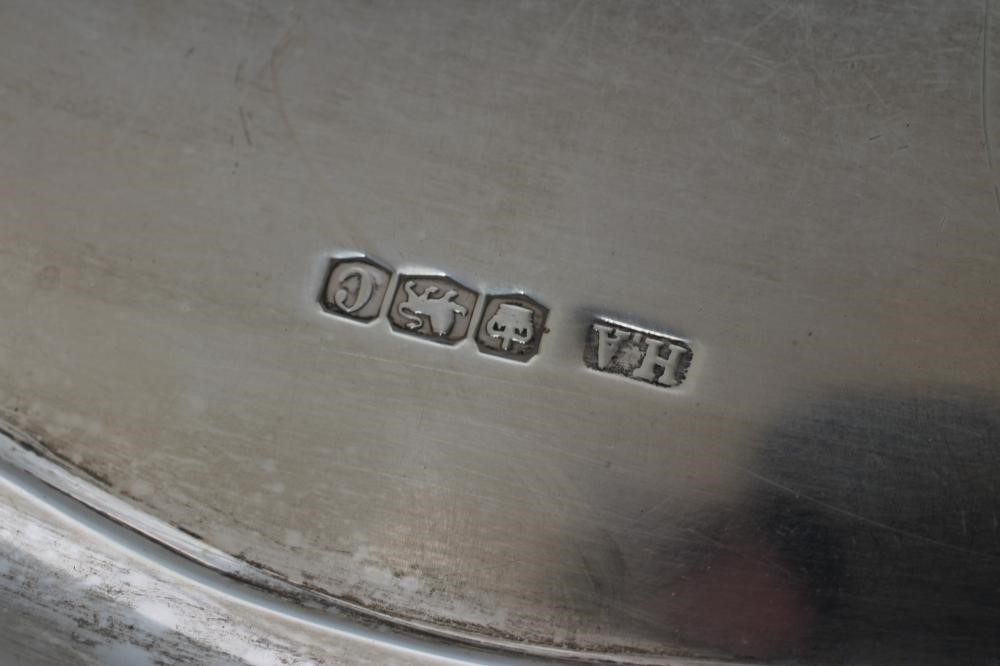 A TWO HANDLED TEA TRAY, maker's mark HA, Sheffield 1920, of shaped oblong form with pie-crust rim, Image