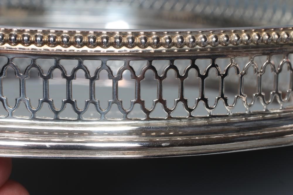 A CIRCULAR GALLERIED TRAY Image