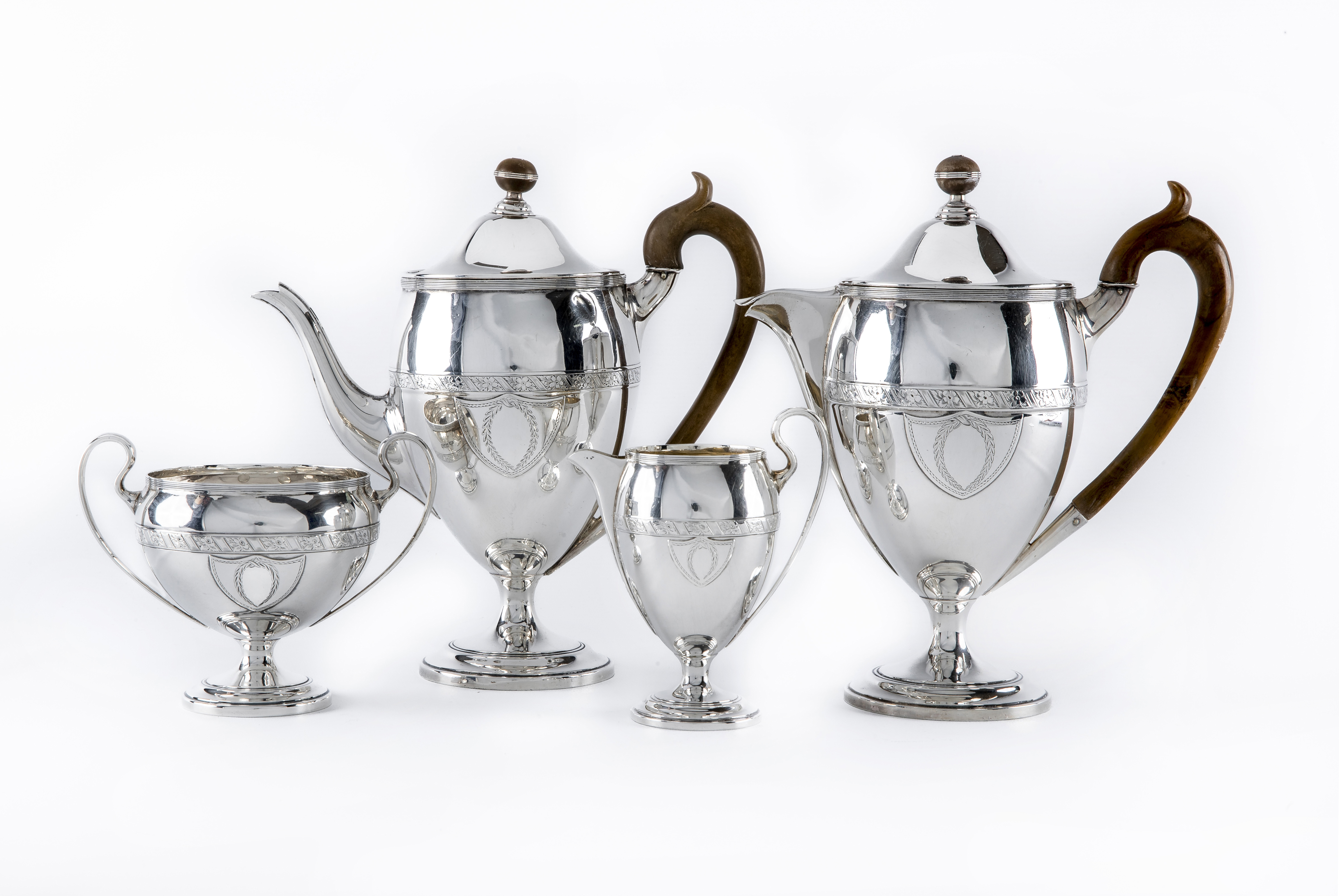 A COMPOSITE FOUR PIECE TEA AND COFFEE SERVICE Image