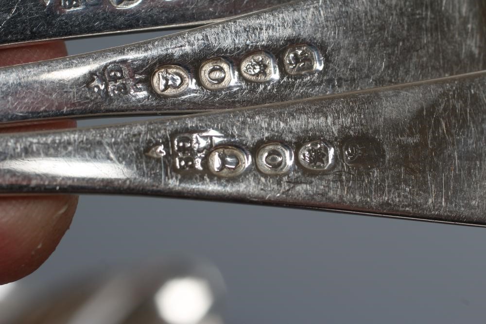 A SET OF SIX LATE GEORGE III TABLESPOONS Image