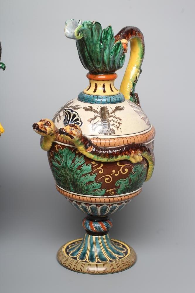 A PAIR OF MAIOLICA PEDESTAL EWERS Image