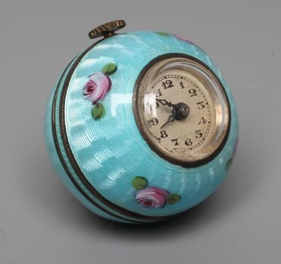 A LADY'S SILVER AND ENAMEL PENDANT BALL WATCH Image