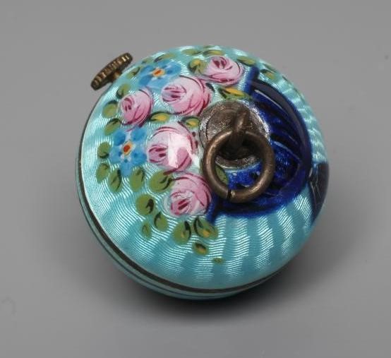 A LADY'S SILVER AND ENAMEL PENDANT BALL WATCH Image