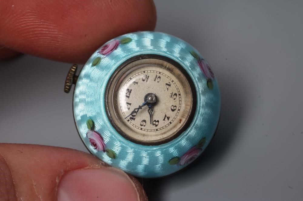 A LADY'S SILVER AND ENAMEL PENDANT BALL WATCH Image