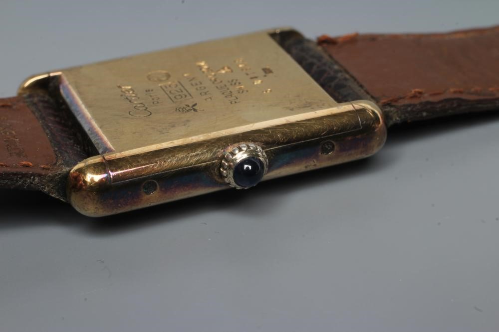 A MUST DE CARTIER SILVER GILT WRISTWATCH Image