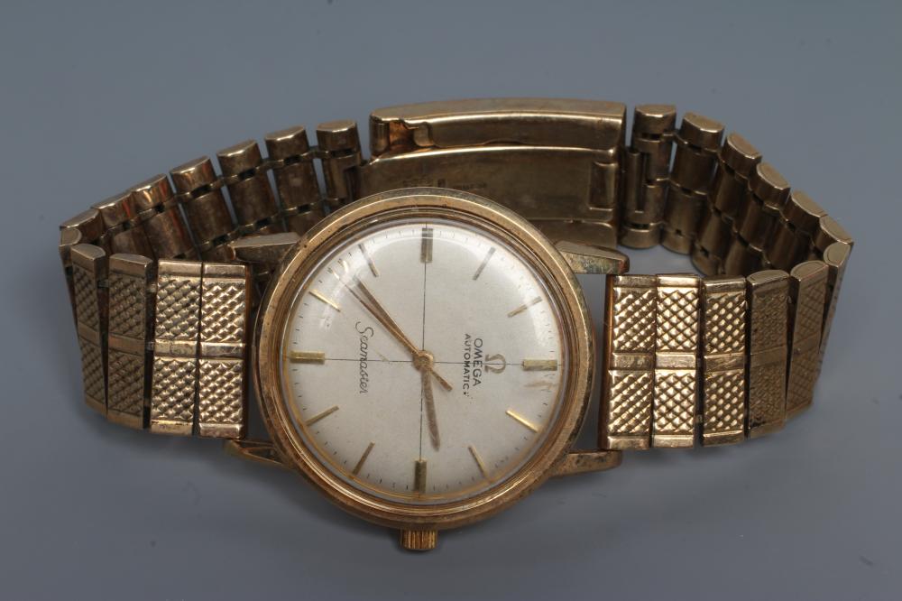 A GENTLEMAN'S 9CT GOLD OMEGA AUTOMATIC SEAMASTER WRISTWATCH Image