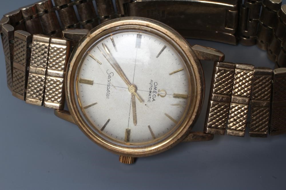 A GENTLEMAN'S 9CT GOLD OMEGA AUTOMATIC SEAMASTER WRISTWATCH Image