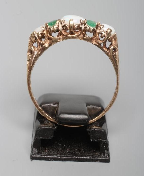 AN OPAL AND EMERALD RING Image