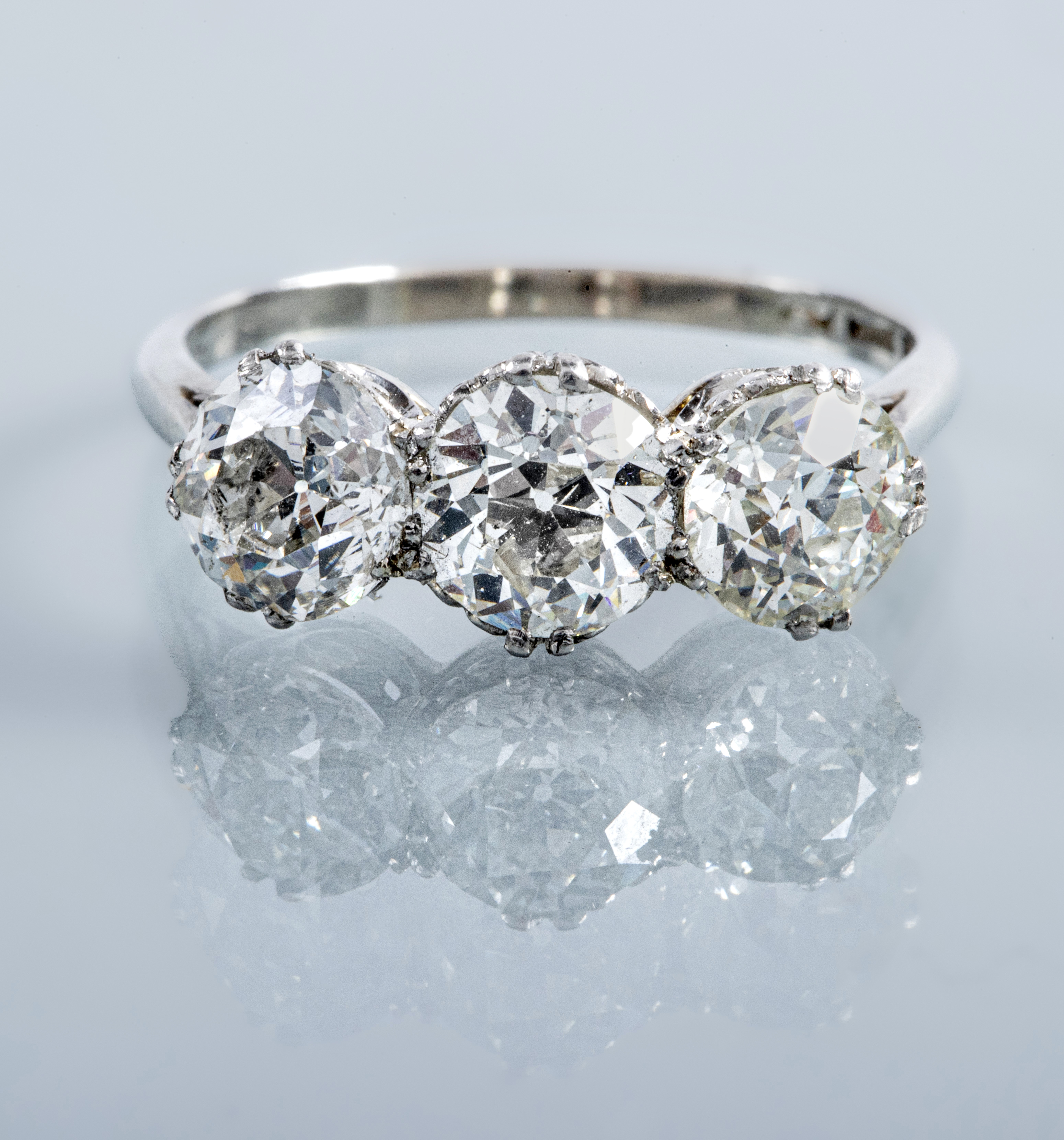 A THREE STONE DIAMOND RING Image