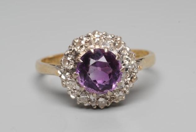 AN AMETHYST AND DIAMOND CLUSTER RING Image
