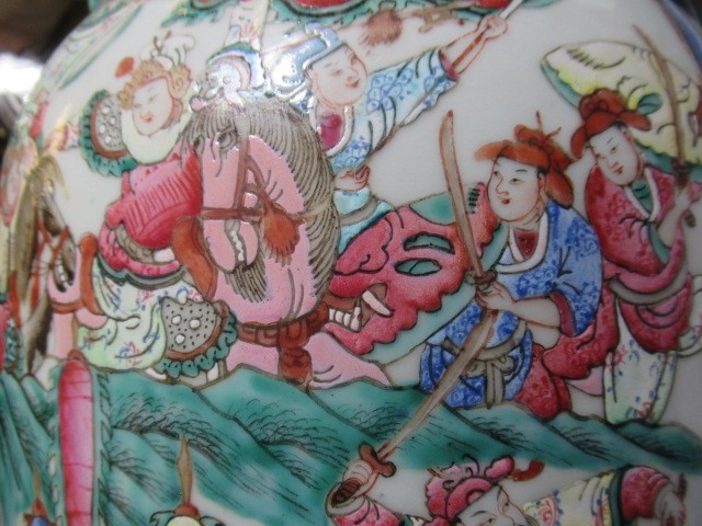 A PAIR OF CANTONESE PORCELAIN FAMILLE ROSE ROULEAU ALCOVE VASES with shi-shi handles and salamanders Image