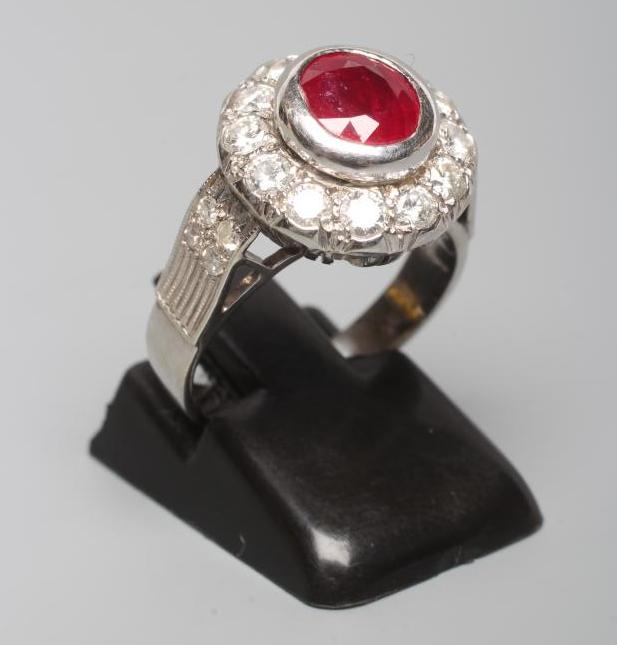 A RUBY AND DIAMOND CLUSTER RING Image
